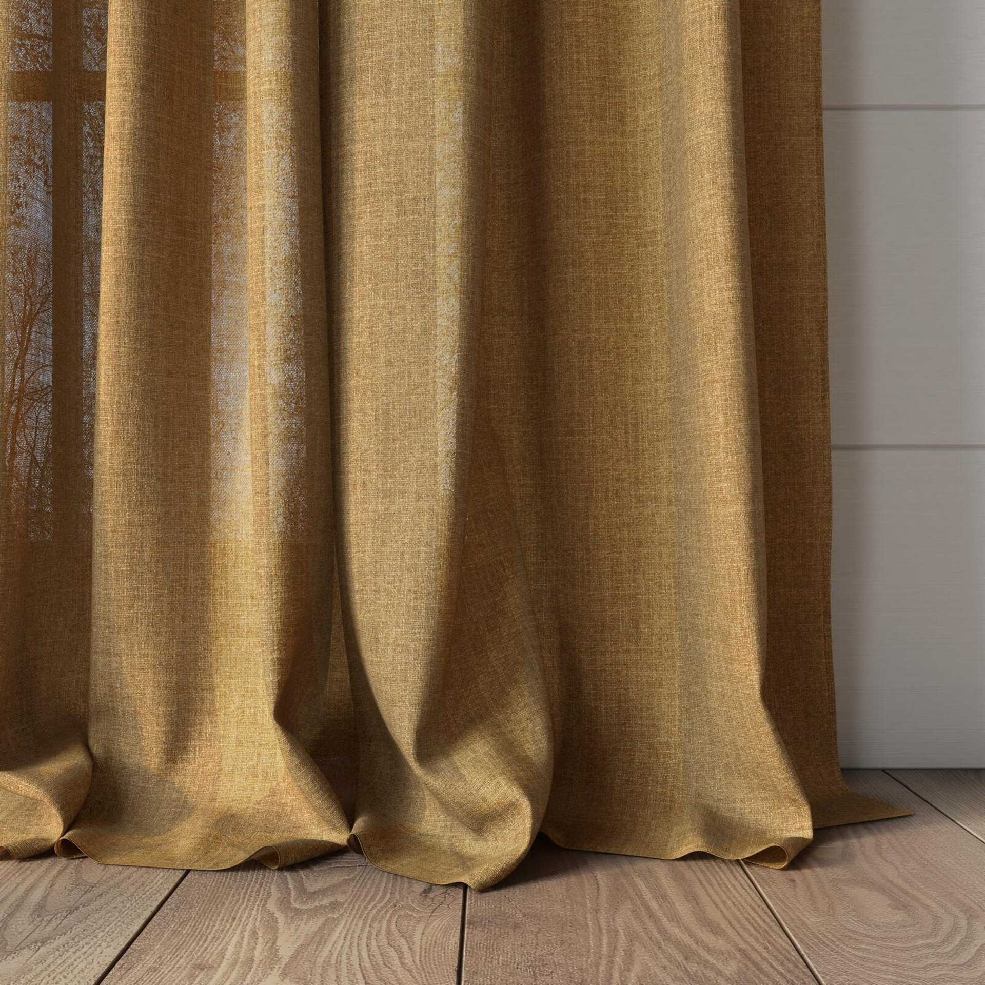 Bottom view of Motion Gold, puddled, on curtain rod