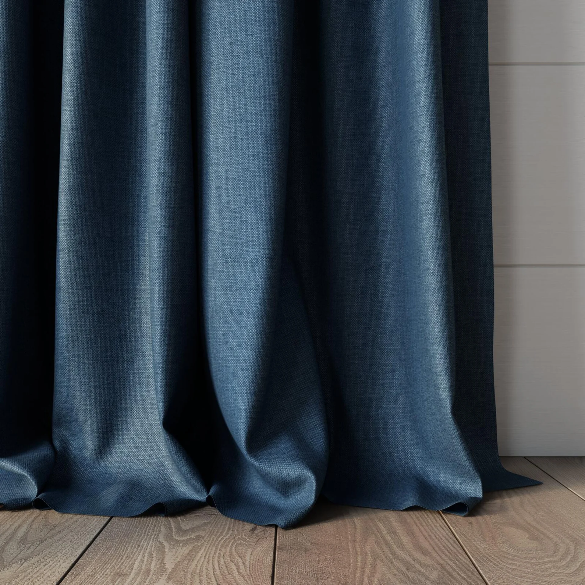 Bottom view of Perfecto Denim, puddled, on curtain rod
