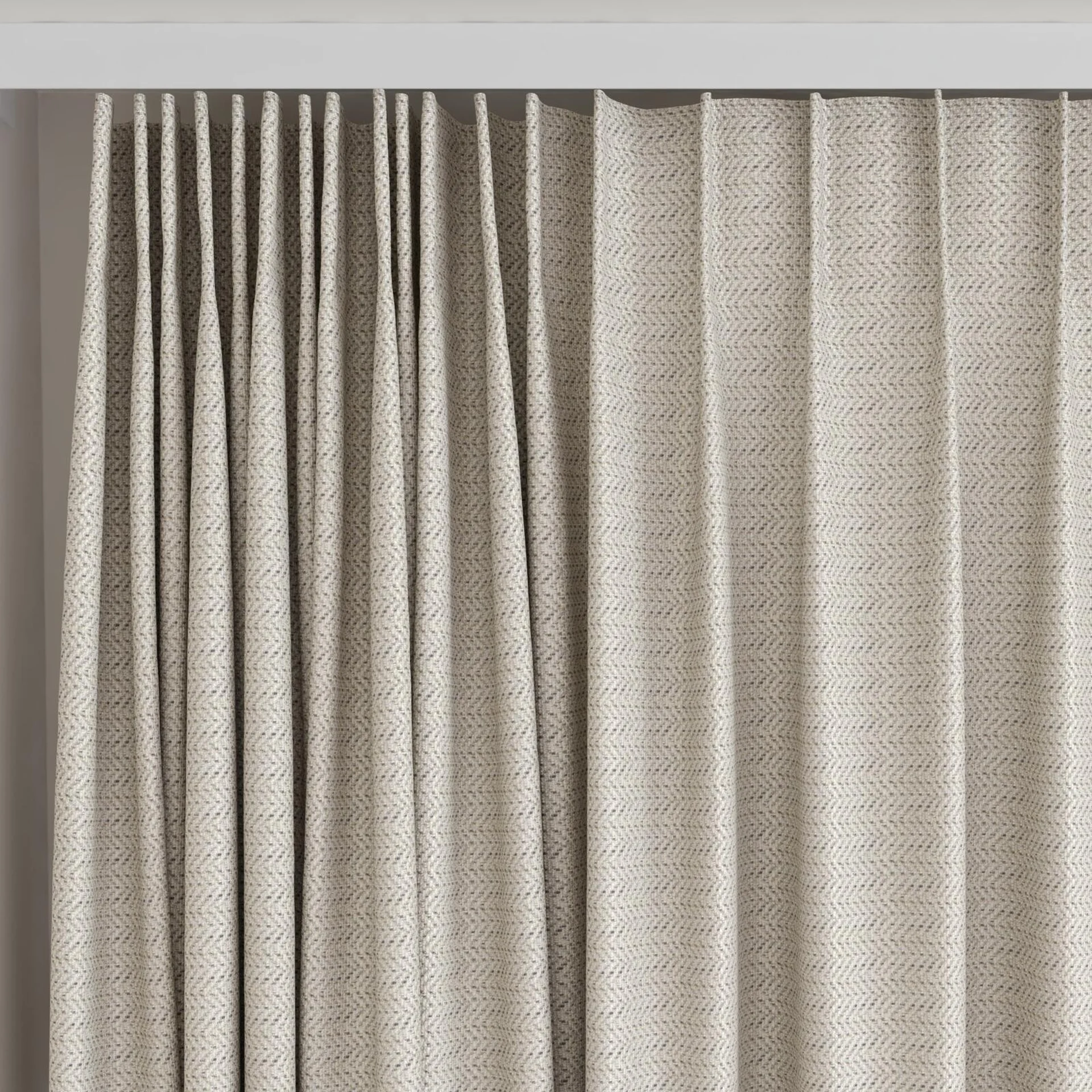 Top view of Kaomoji Sesame, on curtain rail
