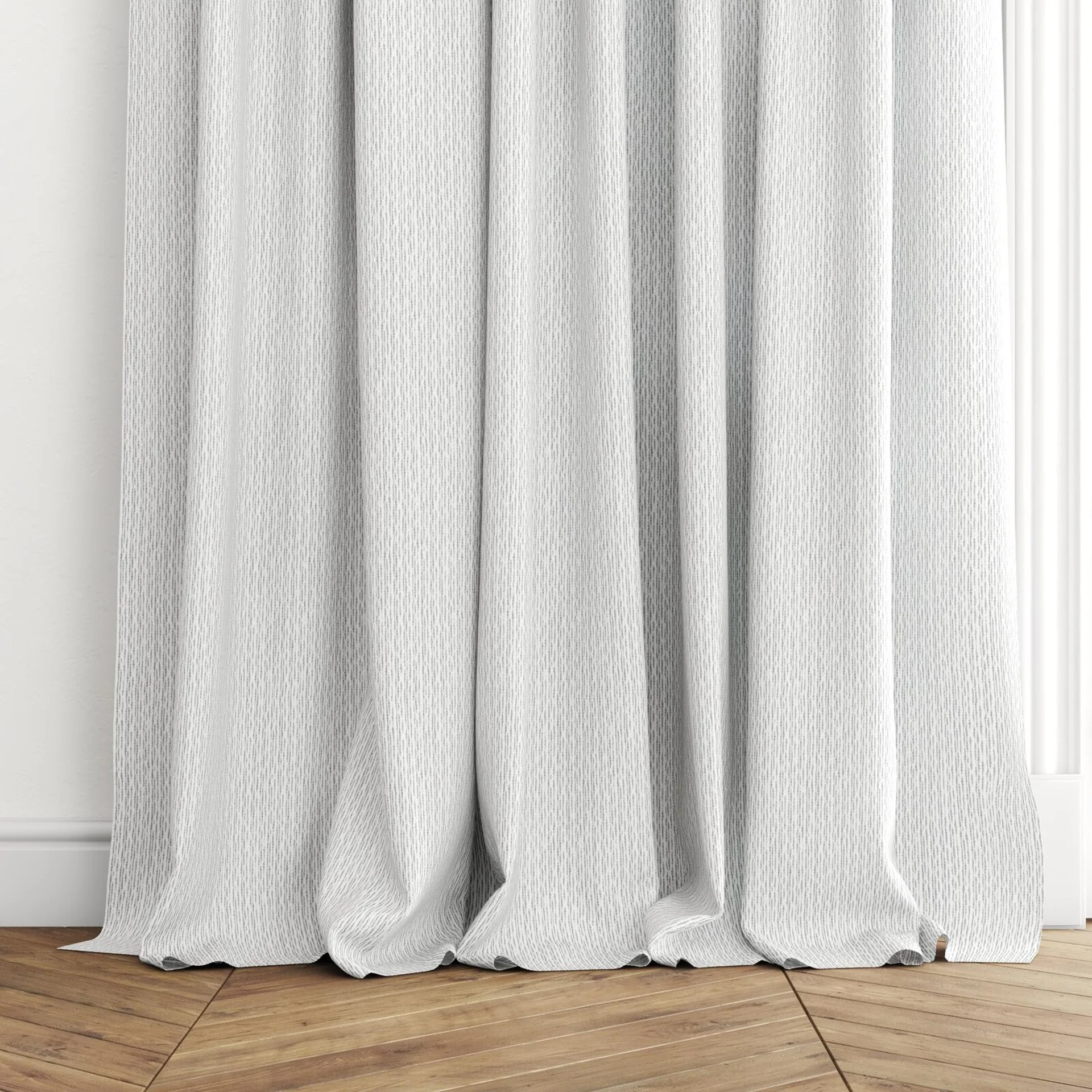 Bottom view of Semblance Pearl, puddled with pinch pleat, on curtain rod