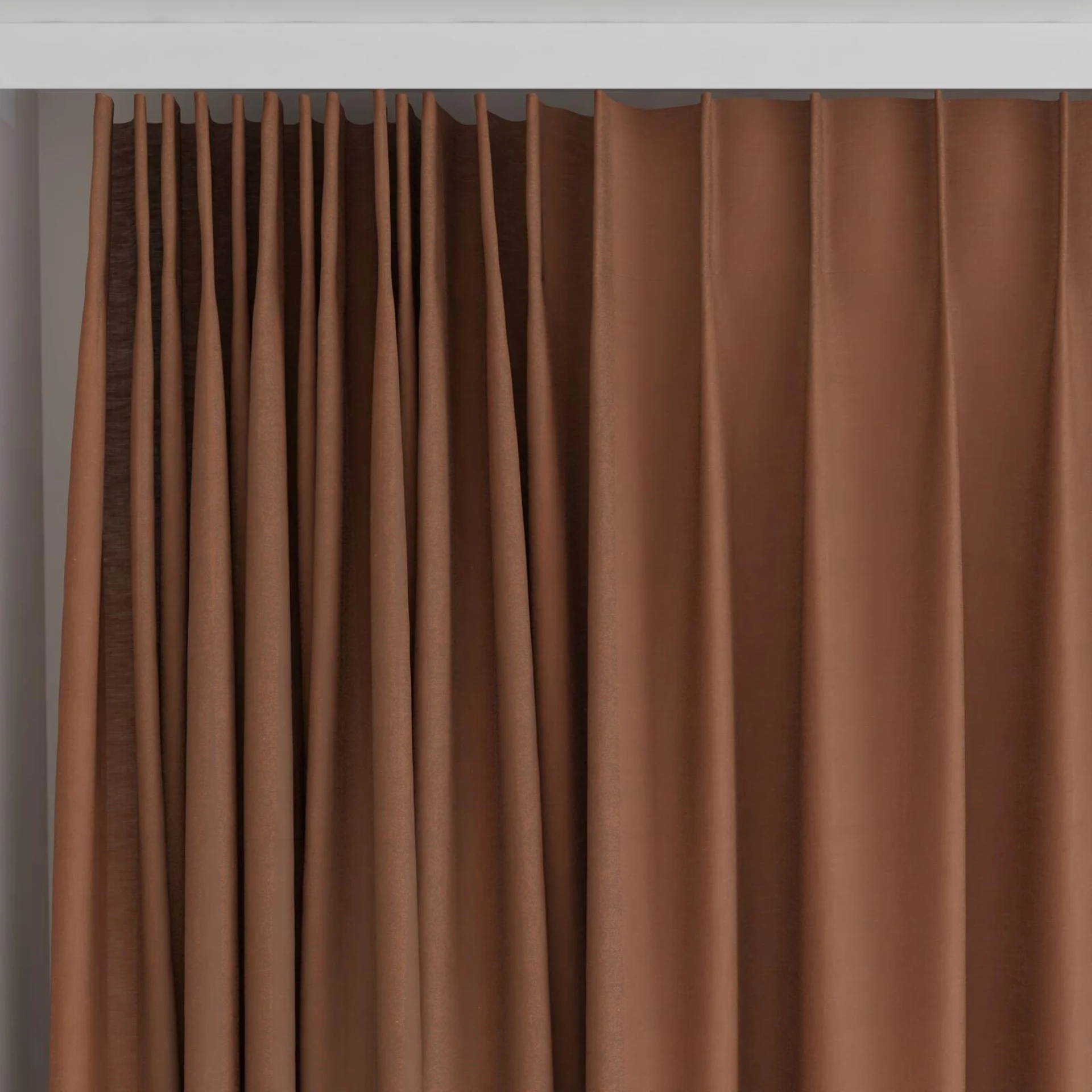 Top view of Gouache Raw Sienna, on curtain rail