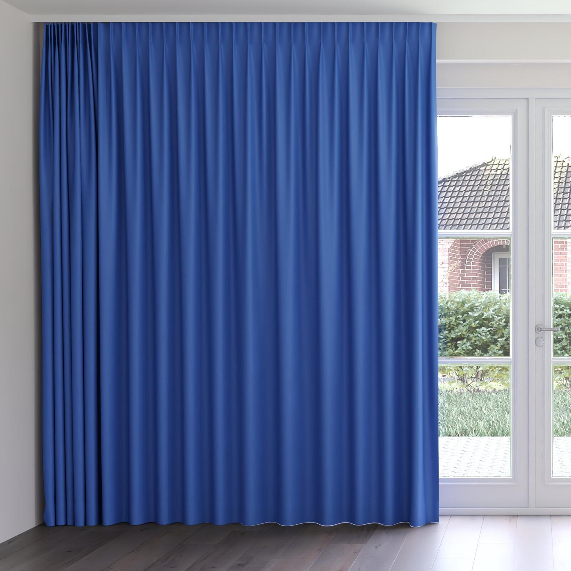Front view of Ultra Dim Indigo, on curtain rail