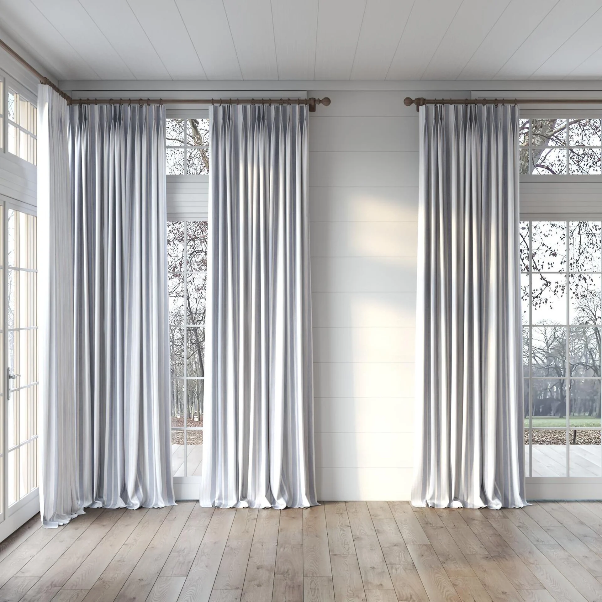 Full view of Chambray Multi Denim, puddled, on curtain rod