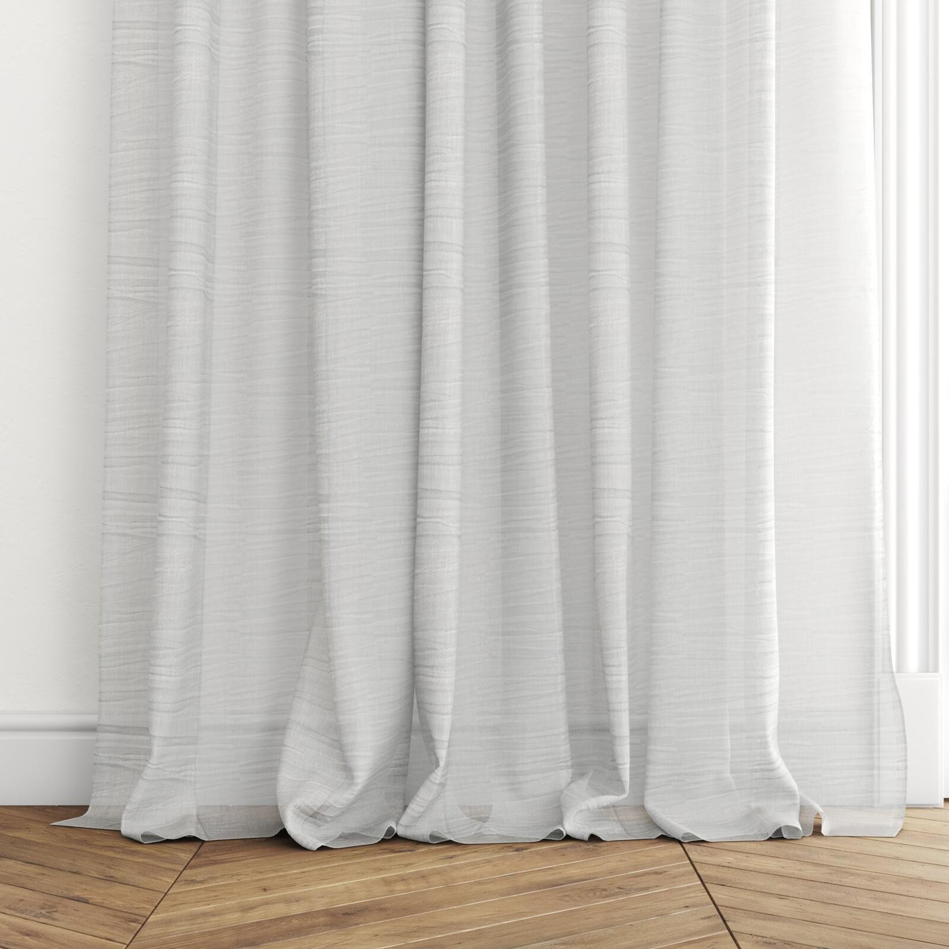 Bottom view of Impression Willow, puddled with pinch pleat, on curtain rod